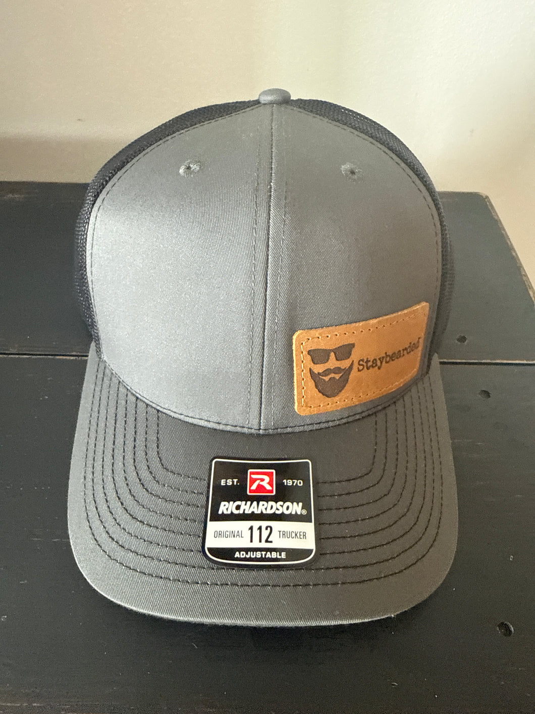 Leather patch Snapback Hats Gray w/black mesh back.  - Left side Leather patch.